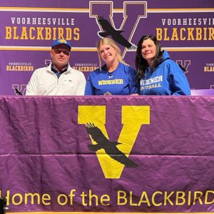 Three people sit at Home of the Blackbirds table