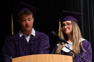 Students on graduation stage.