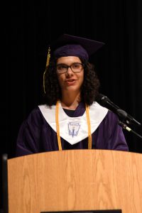 Student on graduation stage.