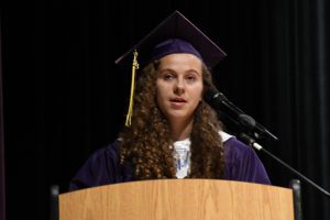 Student on graduation stage.