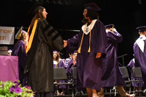 Student receiving diploma