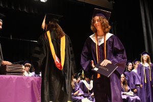 Student receiving diploma