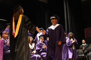 Student receiving diploma