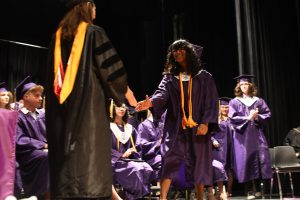 Student receiving diploma