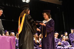 Student receiving diploma