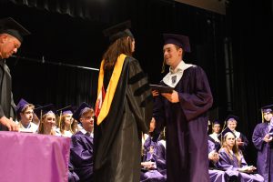 Student receiving diploma