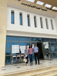 Student and parents outside a building in Tunisia