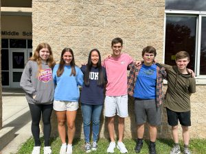 Clayton A. Bouton seniors stand together.