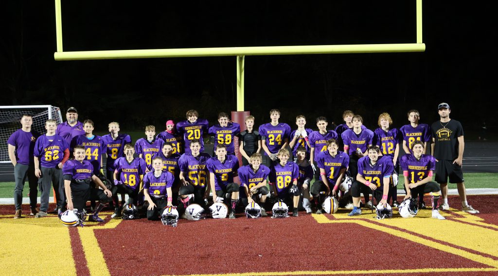 Group photo of modified football team.