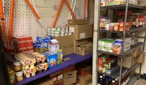 Food items on tables and shelves in Blackbird Community Shop.