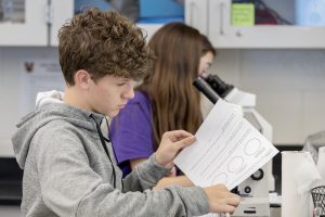 Two students in a science lab.