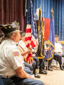 Members of Greenville American Legion Color Guard with flags.